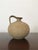 Stoneware vase, modern vintage, designed and produced by the Italian artist Bruno Gambone in shades of light brown,...