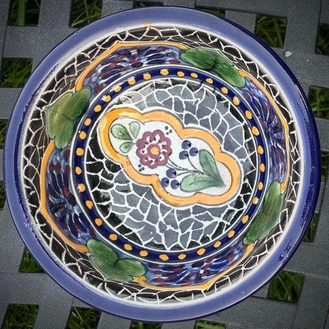"Vintage Mexican Talavera bowl hand-crafted by La Concordia. Features intricate white 'delimitado' web lines over deep...