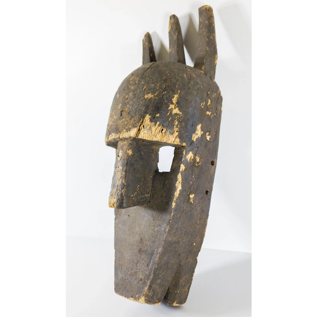 We are selling this decorative mid century vintage African mask. This carved wood tribal mask is from the Bamana Bambara...