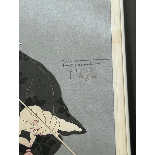 A Japanese Woodblock print by Paul Jacoulet (French, 1896-1960) entitled Les Lotus Noir (Black Lotus Chinese). Created in...