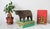 Hand carved Crate and Barrel Brown Wood Bull Sculpture. Some age wear to wood. Pictured. Made in India. No makers mark.