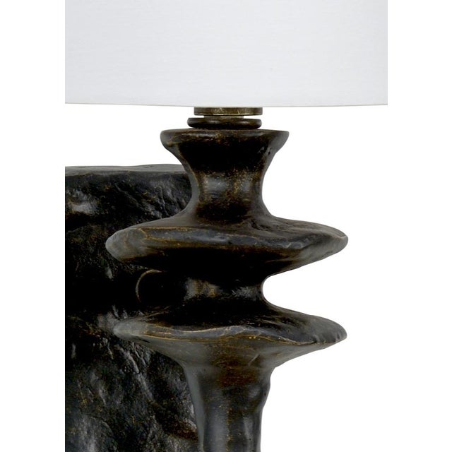 Bronze finish on cast aluminum 17h x 3.5w x 6d Shade Dimensions: top(5) bottom(7) side(7.5)