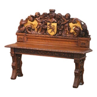 19th C. French Renaissance Carved Oak and Gilt Hall Bench With Heraldic Crest For Sale