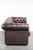 This brown English-style cowhide Chesterfield 3-seater sofa features beautiful details and is finished with loose seat...