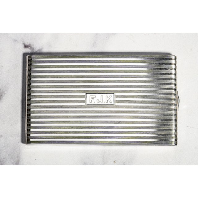 An exceptional piece of mid-century American silver with remarkable corporate provenance, this substantial sterling silver...