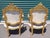 A fine pair of antique French Rococo style burger chairs. Features wood carved frames under plaster sparkly fabric in good...
