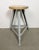 Vintage Industrial factory stool made in former Czechoslovakia during the 1960s It features a wooden seat and a grey iron...