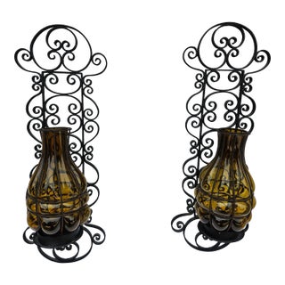 Pair Metal and Caged Amber Glass Candle Holders Sconces For Sale