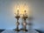 A wonderful tall Italian Hollywood Regency table lamps a pair, features long gilt metal wheatsheaves, carved marble with...