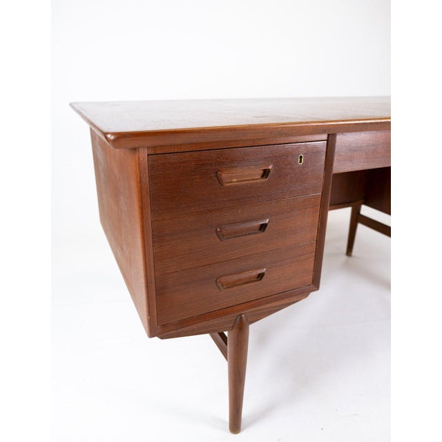 Desk in teak of Danish design from the 1960s. The desk is in great vintage condition.