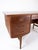 Desk in teak of Danish design from the 1960s. The desk is in great vintage condition.