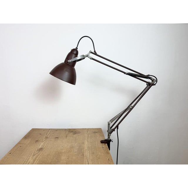Vintage brown adjustable table lamp made by napako ( model lh 4937 ) in former czechoslovakia during the 1950s. It...