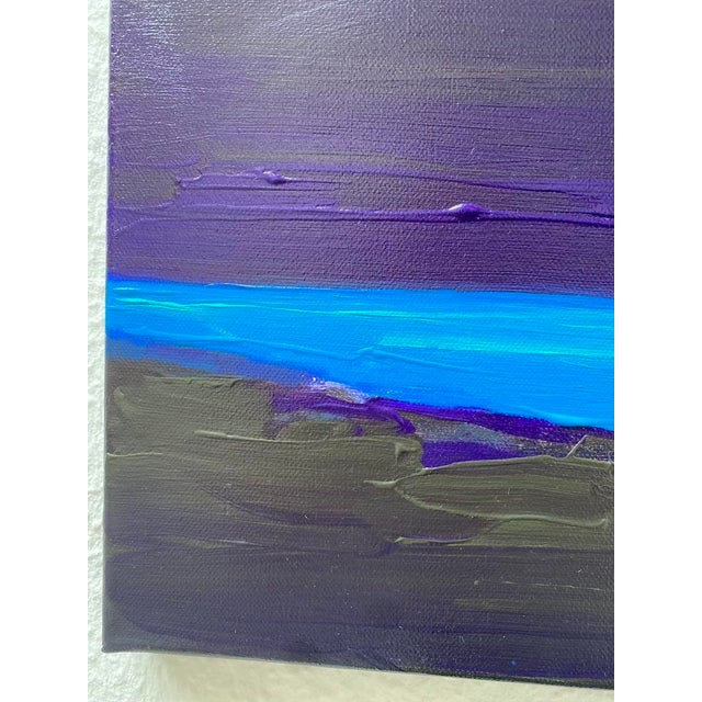 This seascape from the 2026 series by Gyunay Aliev captures a tranquil, dreamlike atmosphere, where bright blue and deep...