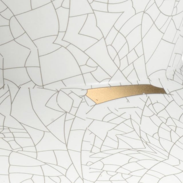 Metallic gold and cream crackled flower vase.