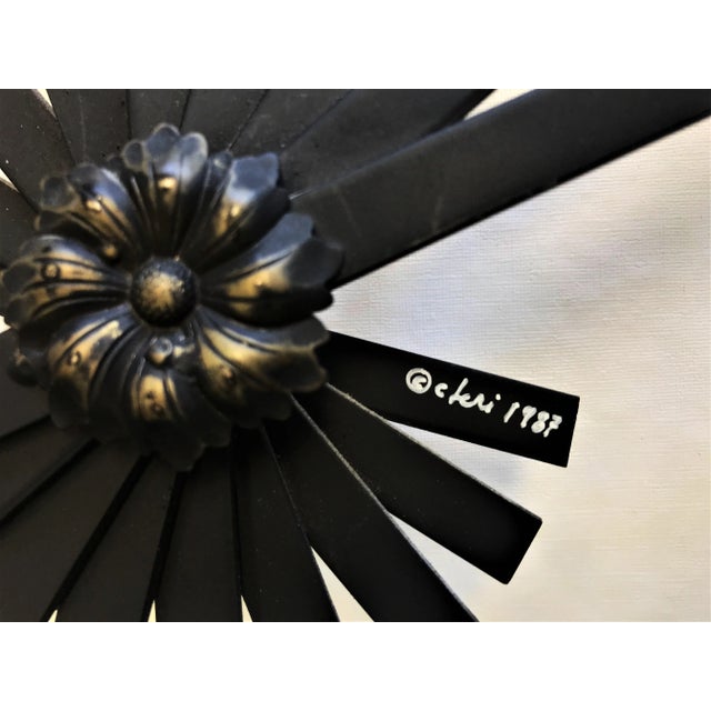 Beautifully made and signed 'Curtis Jere' decorative metal fan circa 1987. The fan has a lovely patina in shades of gold,...