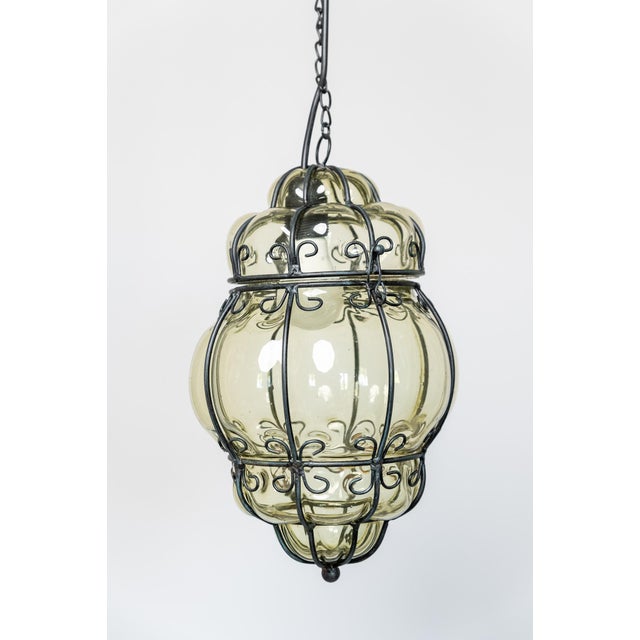 Murano blown glass pendant chandelier, Made in Italy, 1960s. This elegant single-light chandelier is cloud-shaped. The...