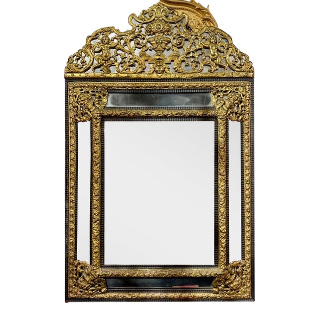 Elegant 19th century Ebony and Brass Repousse' Cushion mirror. Very beautiful intricate and ornate pattern. Makes a...