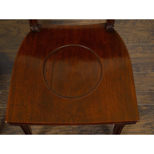 Pair of English Regency Mahogany Hall Chairs with Painted Coat of Arms For Sale - Image 11 of 12