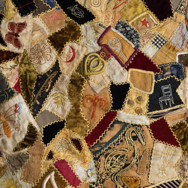 ANTIQUE FOLK ART PATCHWORK ‘CRAZY’ QUILT A stunning example of Victorian folk art quilting. A wealth of typically...