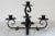 Dark black cast iron 5 candle candelabra. It has a smooth painted black finish, marvelous scroll details and a beautiful...