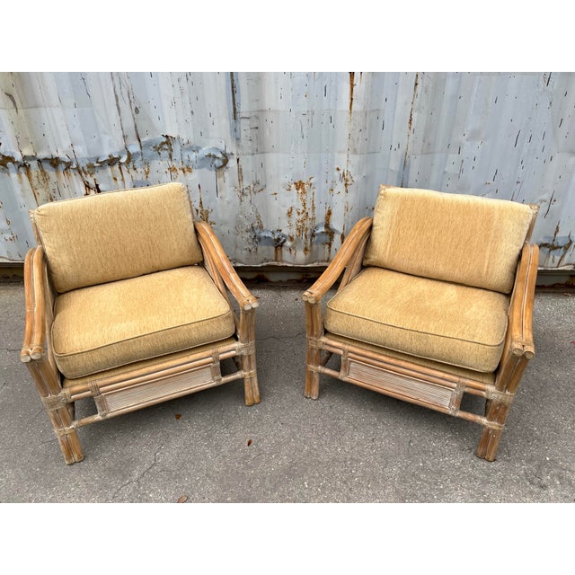 A Pair of Vintage Coastal Style Rattan Lounge Chairs Is the McGuire's Manner. Circa 1980s. Feature a Mid Century Modern...