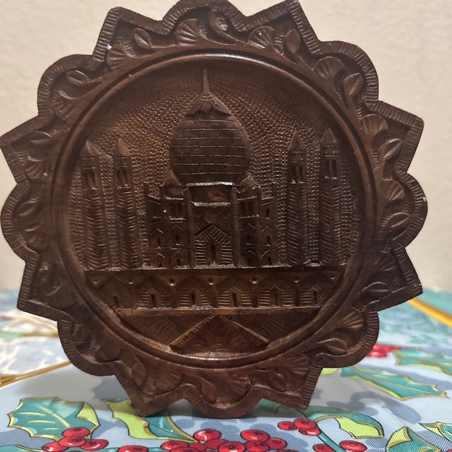 Capture the timeless elegance of one of the world's most famous monuments with this artisanal wooden wall plaque. This...