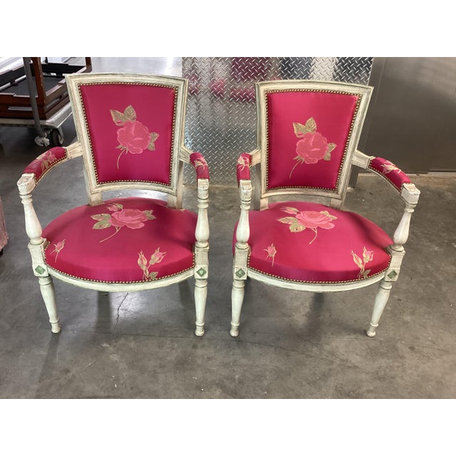This is an amazing pair of French Louis XVI painted and upholstered chairs. The frames retain their original paint, which...