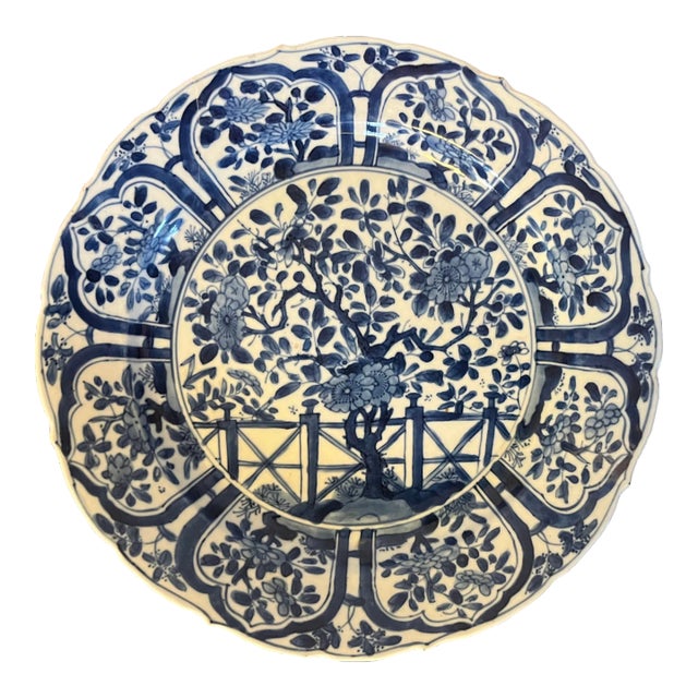 Antique 18th Century Chinese Kangxi Blue and White Porcelain Plate Decorated With Flowering Prunus Tree and Garden Fence For Sale