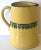 This large ceramic pitcher from the Amalfi coast in Italy is hand thrown pottery and glazed in the warm yellow of the...