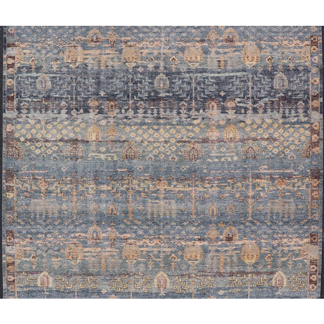 Measures: 10'0 x 14'0 Layered Modern Khotan Rug by Keivan Woven Arts in Blue and Warm Sand 10 x 14. Keivan Woven Arts /...