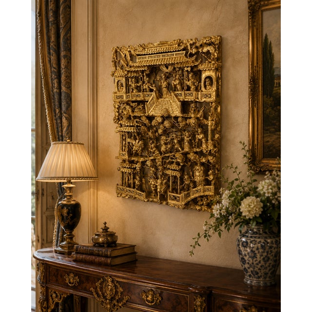 **Early to Mid-20th Century Chinese Giltwood Carved Panel** This exquisite Chinese giltwood panel dates from the early to...