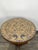 Aztec coffee table made of rosewood. A stylish coffee table with a round top in an Aztec pattern. Crafted from rosewood,...