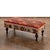 This large-scale bench integrates mid-century Anatolian textile history with heavy-duty woodworking. The primary surface...