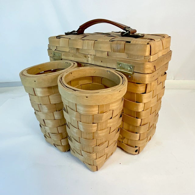 We have here a delightful maple slat woven Wine Basket. It has two cylinder compartments to carry two bottles of wine....
