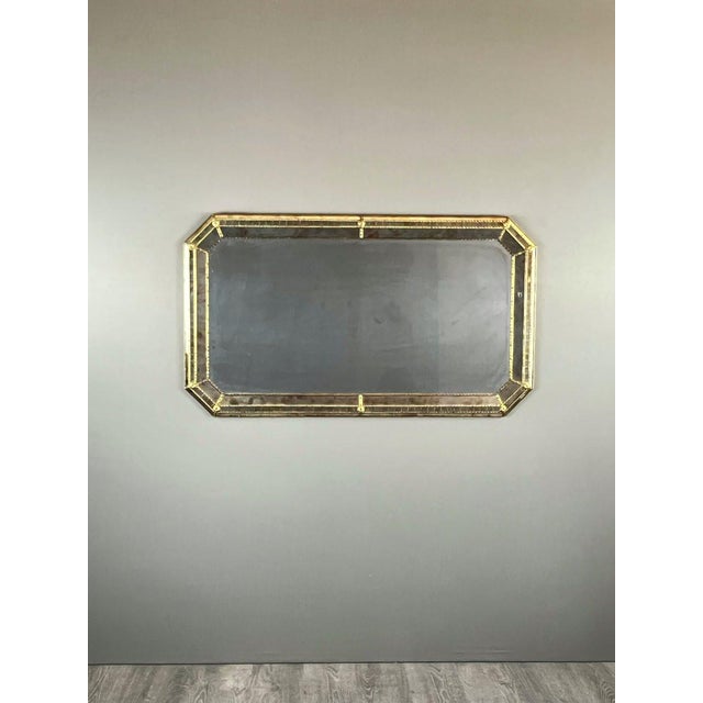 Large rectangular beveled mirror, 20th century Elegant rectangular mirror with beveled edges, framed by mirrors with...