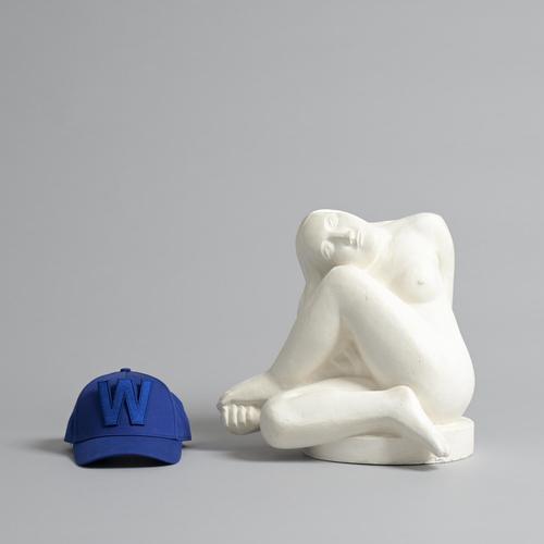 This abstract sculpture in plaster was made by the Belgian artist Jan Keustermans. The sculpture has a rough plaster...