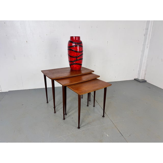 Vintage, Mid-Century, Danish, Teak Nest of Side Tables. Made in Denmark in the 1950s. with drumstick legs.