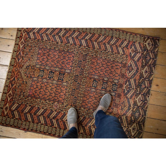 :: Hatchli rug with intricate geometric woven interpretations of leaves, floral top views, germinating plants, ram's...