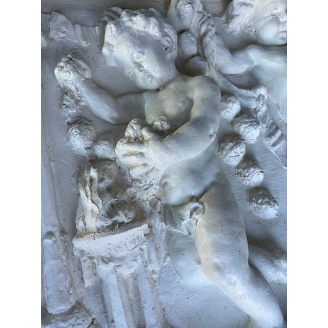 Embrace timeless elegance with the Neoclassic Cherub Wall Relief Sculpture, a magnificent piece that exudes sophistication...