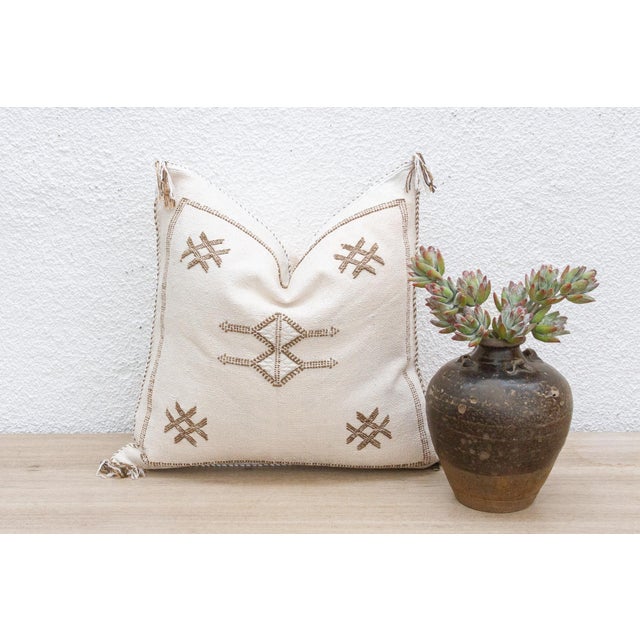 Introduce a touch of organic artistry to your home with our handcrafted 18-inch square cactus silk pillow cover. Woven...