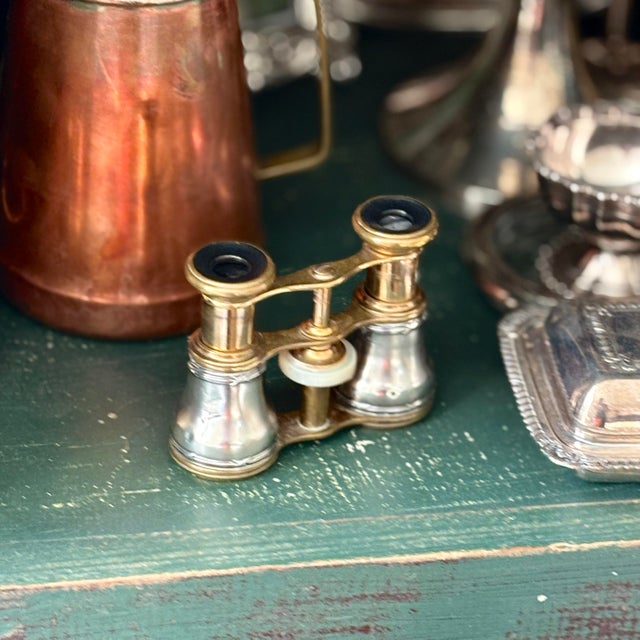 An exceptional pair of late 19th-century German luxury theater glasses. Features solid .800 Continental silver flared...