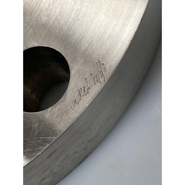 Hand Machined chrome and copper sculptural candelabra with three candle holders. The Candelabra features a round with 3...