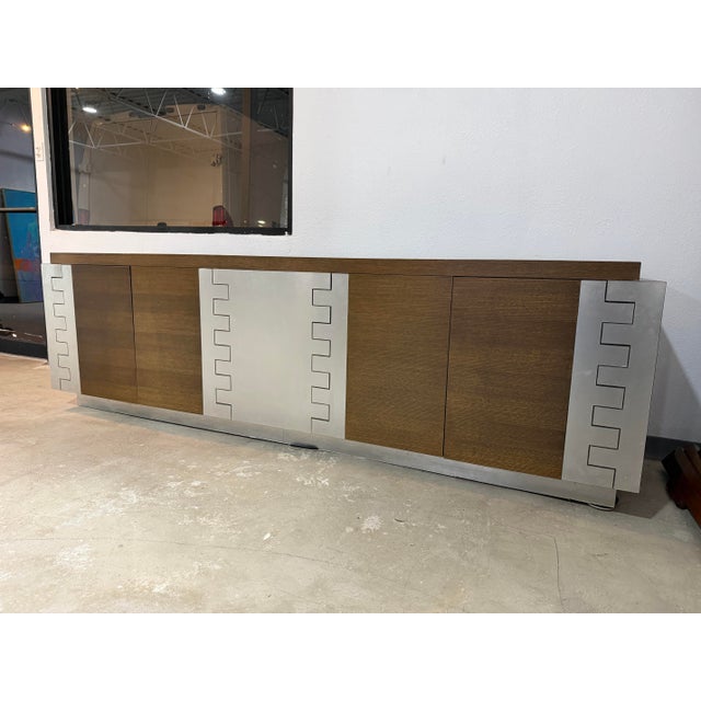 Extra large credenza circa early 2000’s by Jamie Herzlinger inspired by the iconic Paul Evans Cityscape credenza. Four...