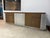 Extra large credenza circa early 2000’s by Jamie Herzlinger inspired by the iconic Paul Evans Cityscape credenza. Four...