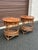 An interesting pair of 1990s faux bamboo, cane, and rattan tables. Tables could be used as large end tables, center...