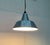 Simple enamel pendant lamp in a special color. Functional pendulum in the classic form of an industrial or workshop light....