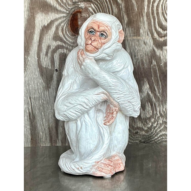 Add whimsical sophistication to your space with this vintage Italian glazed ceramic monkey sculpture, masterfully crafted...