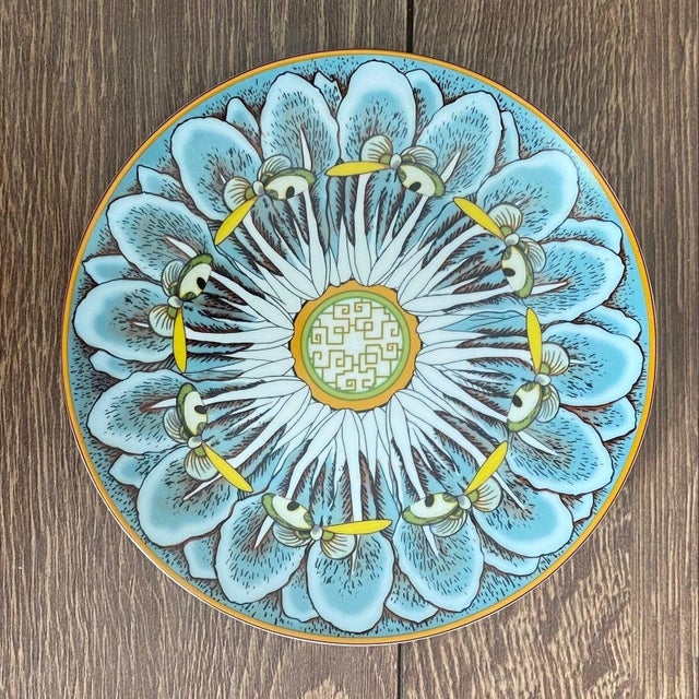 This stunning set of 4 bone china dessert plates features an intricate Bok Choy pattern with a mesmerizing lotus medallion...
