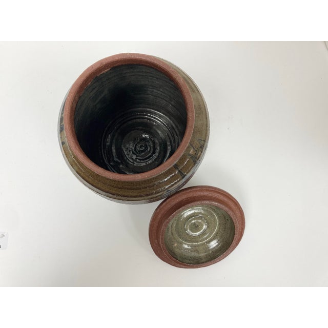 A very well crafted lidded Water Jar in the form of the vessels used in the Japanese Tea Ceremony. The body of the jar is...