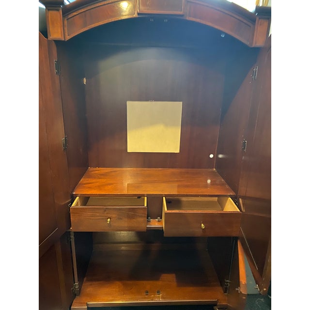 Solid piece of furniture. Still lots of beauty to be enjoyed with this Hickory Chair Armoire. We have downsized our living...